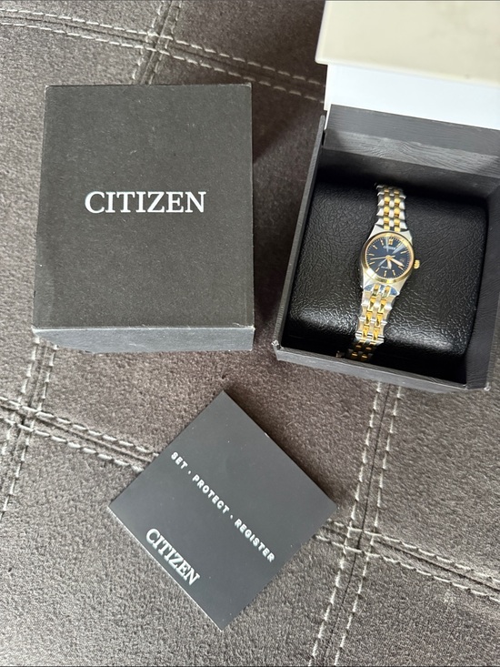 Citizen Accessories - Citizen Eco-Drive Two-Tone Watch withBlue Dial and Gold Accents